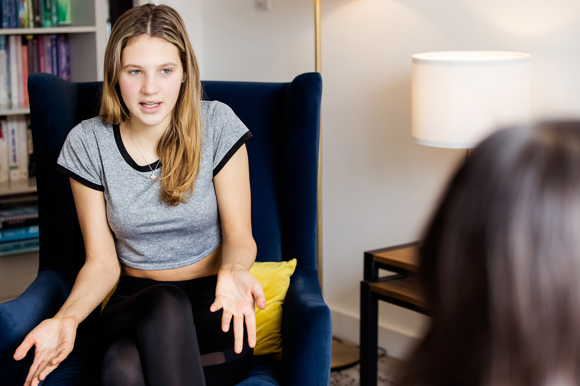 Teenage girl talking during therapy session